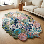 Close-up of a hand tufted floral wool area rug highlighting intricate floral patterns and plush texture in a modern living room.