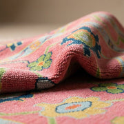 Close-up of the Pink Hand Knotted Rug Oushak highlighting intricate textures and micro-details with soft natural lighting.