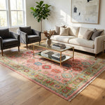 Elegant pink Turkish Oushak hand-knotted rug displayed in a modern living room with minimalist neutral furniture, emphasizing intricate patterns and plush texture.